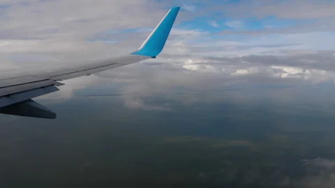 View through a airplane window Stock Footage 290428347