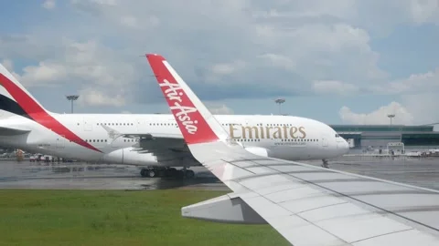 View through the airplane window while taxing to departure from airport wit.. Stock Footage 249665454