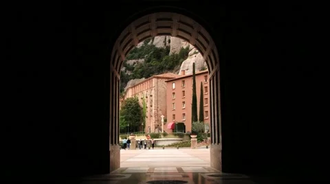 View through the arch at the abbey Santa Maria de Montserrat. Stock Footage 61543317