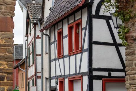 View through an arch at a row of half-timbered houses in Bad Muenstereifel Stock Photos