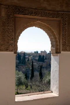 View through arch window with Islamic or Arabic decoration Stock Photos