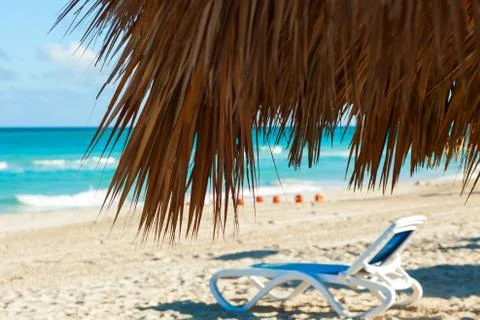 View through beach bamboo umbrella. Atlantic ocean, Varadero, Cuba Stock Photos