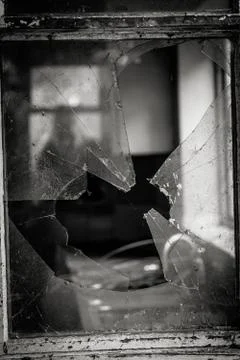 A View Through A Broken Window In A Derelict Building Stock Photos