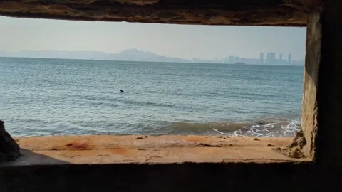 View through bunker window of Xiamen China across Taiwan strait 库存影片 321623770