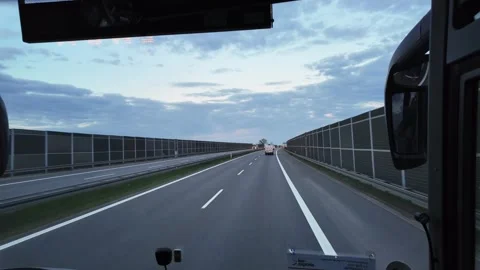 View through a bus windshield while driving Stock Footage 342318976