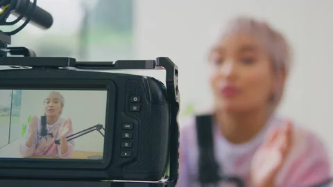 View Through Camera Of Female Vlogger Live Streaming Online Electronics Product 動画素材 220557863