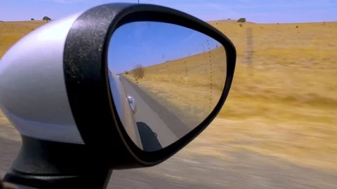 View Through Car Mirror Driving on the Road Stock Footage 85143434