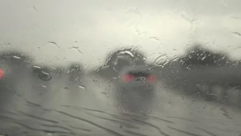 View Through Car Windshield with Blurred Traffic and Bokeh Lights Video stock 327589745