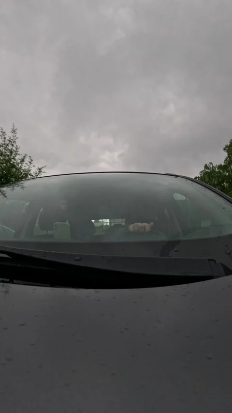 View through car windshield on a rainy day Stock Footage 276958452