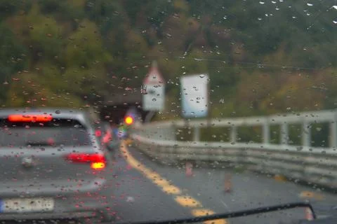View through a car windshield wet from rain. 스톡 사진