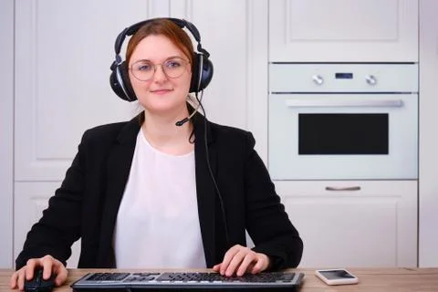 View through a computer camera during an online video call. Business woman in Stock Photos