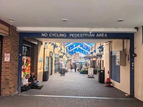 View through a covered passage into the bustling St Peters Walk pedestrian Stock Photos
