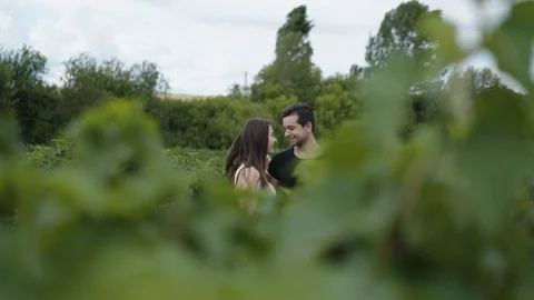 View through the currant branches of lovely couple 動画素材 121262696