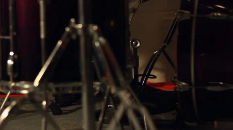 View through drum stands to bass foot pedal Video stock 35404950