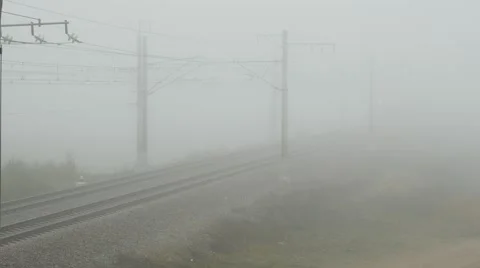 View through the fog of passenger train moving, 4k footage Stock Footage 55900223
