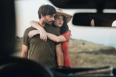 View Through Front Window of Car, Young Couple Man and Woman Having Fun Time Stockfoto's