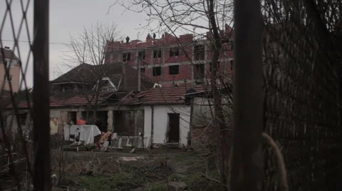 View through the gate on the old household and construction site. Stock Footage 46572589