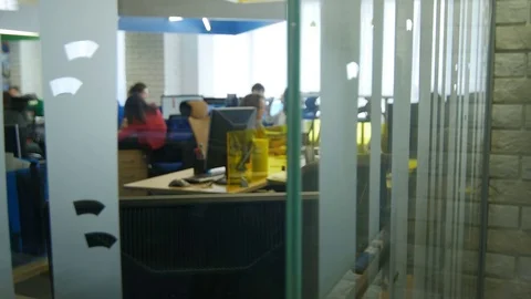 View Through Glass of Large Modern Room with Office Workers Stock Footage 73868891