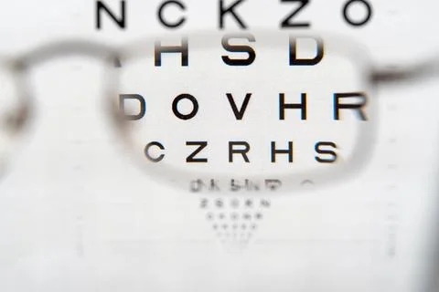 View through glasses vision test table, eye chart Stock Photos
