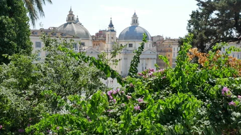 View through green trees on Piazza del Popolo in Rome, Italy - 4K, Handheld Stock Footage 157163750