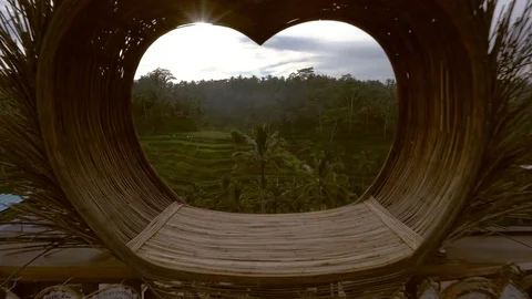 View Through the Heart Shape Attraction in Bali for the Rice Terrace. Stock Footage 107602891