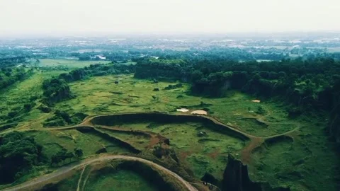 A view through the hilly green Village Stock Footage 283841059