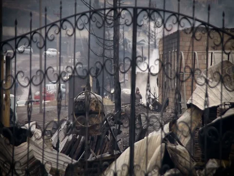 View Through the Iron Gate, Defocusing. View of the Burned Village Stock Footage 71556721