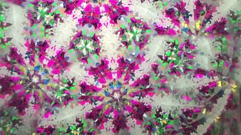 View through a kaleidoscope forming mirrored patterns Stock Footage 150378173