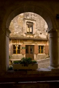 View through loggia window on the stone Groznjan Stock Photos