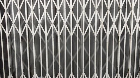 View Through Manual Steel Gate Of Vintage Elevator Ascending In Hong Kong. Video stock 165647872