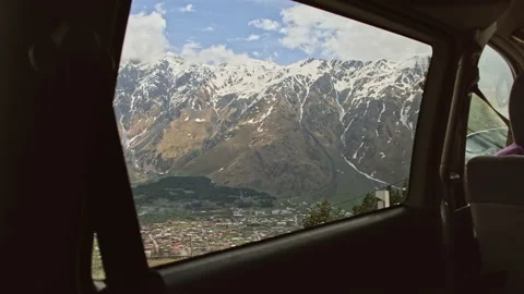 View through the moving car window a trip to the mountains Stock Footage 153973178