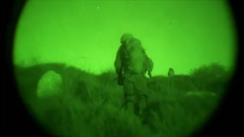 View through night vision in a mission operation.Subdivision army anti terrorist Stock Footage 139477268