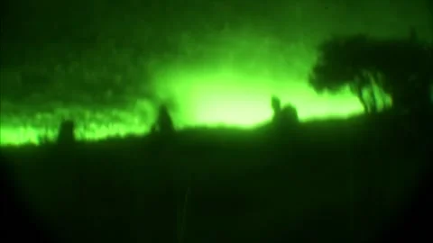View through night vision in a mission operation.Subdivision army anti terrorist Stock Footage 139477274