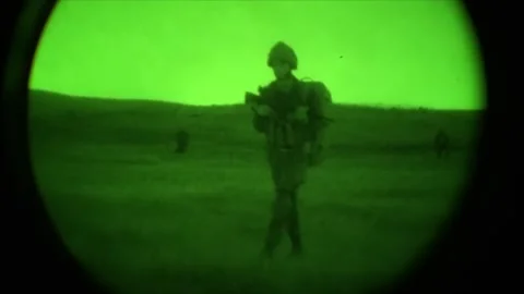 View through night vision in a mission operation.Subdivision army anti terrorist Stock Footage 139477278