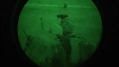 View through night vision in a mission operation.Subdivision army anti terrorist Stock Footage 139477287