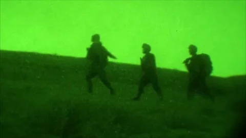 View through night vision in a mission operation.Subdivision army anti terrorist Stock Footage 139477301