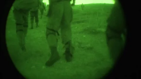 View through night vision in a mission operation.Subdivision army anti terrorist Stock Footage 139477314