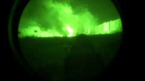 View through night vision in a mission operation.Subdivision army anti terrorist Stock Footage 139477330