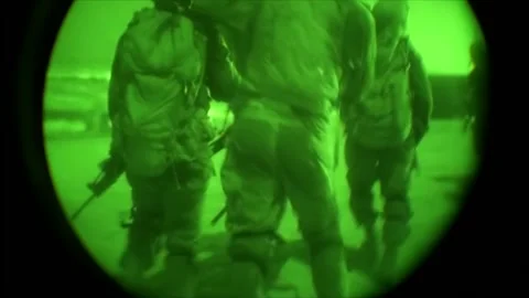 View through night vision in a mission operation.Subdivision army anti terrorist Stock Footage 139477459