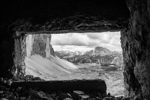 View through an old embrasure in an alpine fortress of the World War I, marki Stock Photos