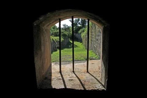 The view through an old jail window, in an historic fort Stock Photos