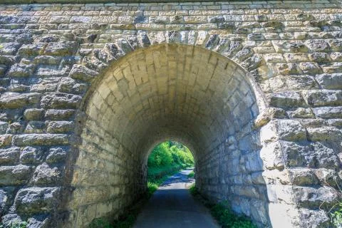 View through an old tunnel over which the train travels Foto stock