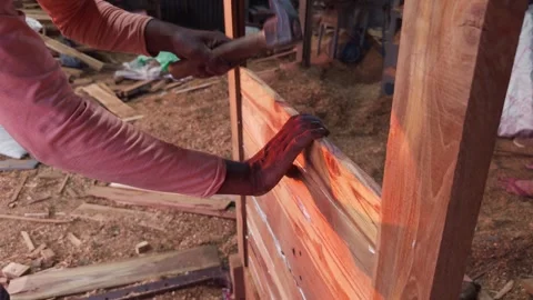 View through an open door of a rustic woodworking workshop with scattered w.. Stock Footage 266864603