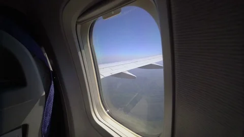 View through a passenger airplane window flying over the Crimea Stock Footage