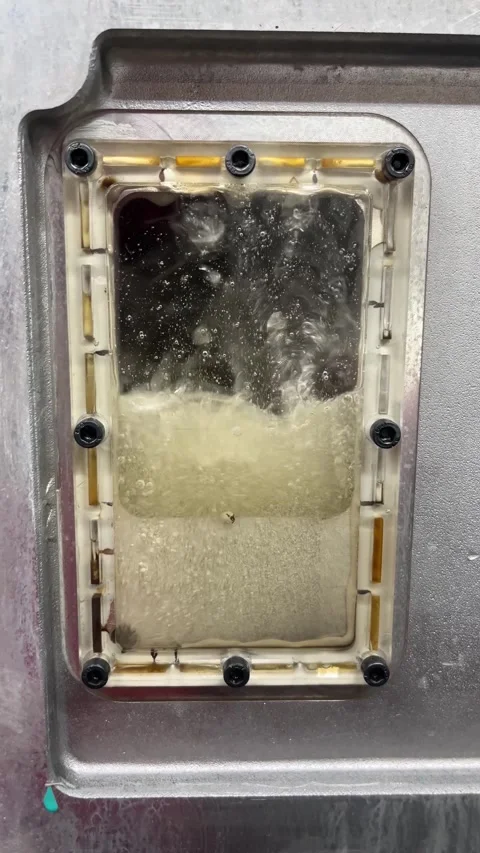 View through plexiglass at the machine's lubricating oil Stock Footage 341826698