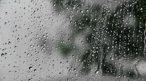View through a rain-spattered clear tent panel Stock Footage 28694200