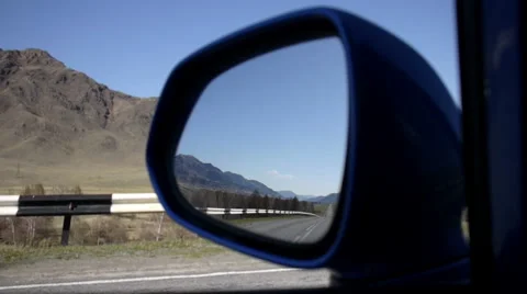 View through rear car mirror reflection with mountain background landscape Stock Footage 49968382
