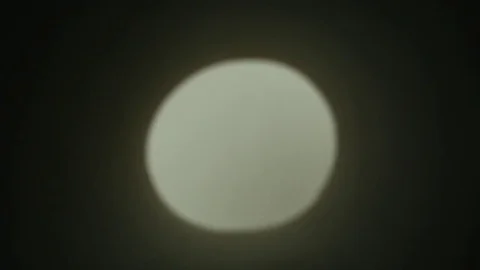 A view through a round hole on the smiling girl. Video stock 76254814