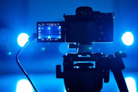 View through screen of video camera on ice arena in blue light. Process of Stock Photos