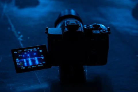 View through the screen of the video camera on the ice arena in blue light. The Stock Photos